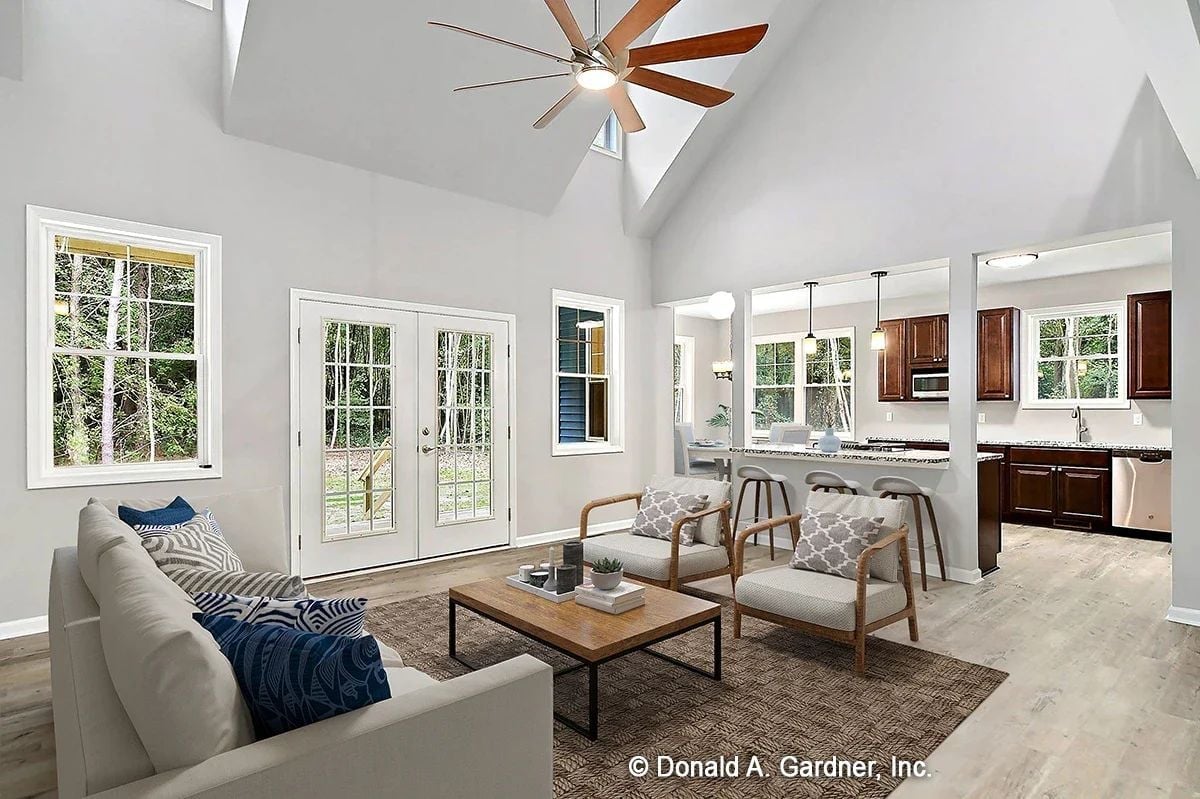 Vaulted Great Room Where the Kitchen Stays in Conversation