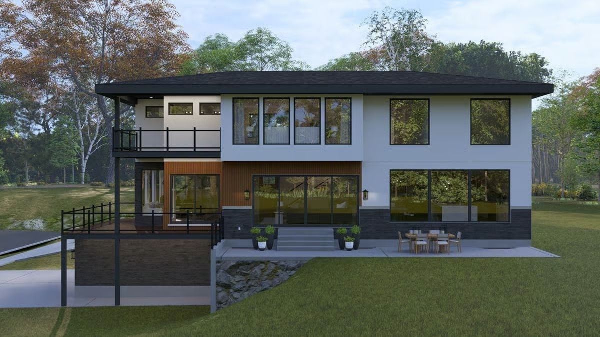 Dark Roof, Big Glass, and Wood Cladding Make This Rear Elevation Worth Studying