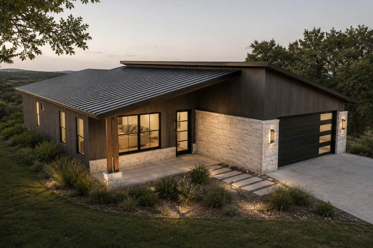 Monopitch Roof, Stone Base, and Warm Light Spilling Out at Dusk