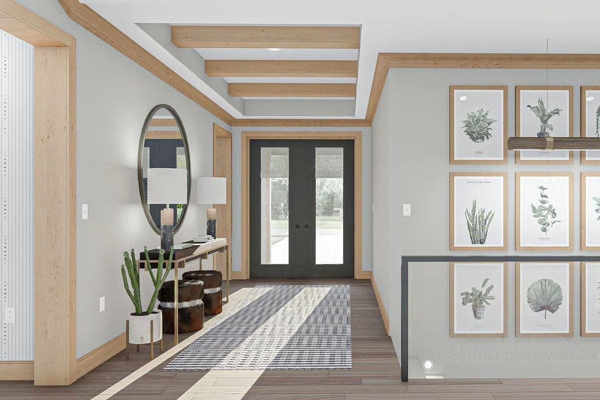 Wood Trim and Botanical Prints Turn a Front Entryway Into Something Worth Coming Home To