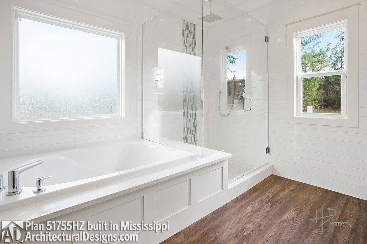 Frosted Glass, Chrome Filler, and a Soaking Tub That Justifies the Square Footage