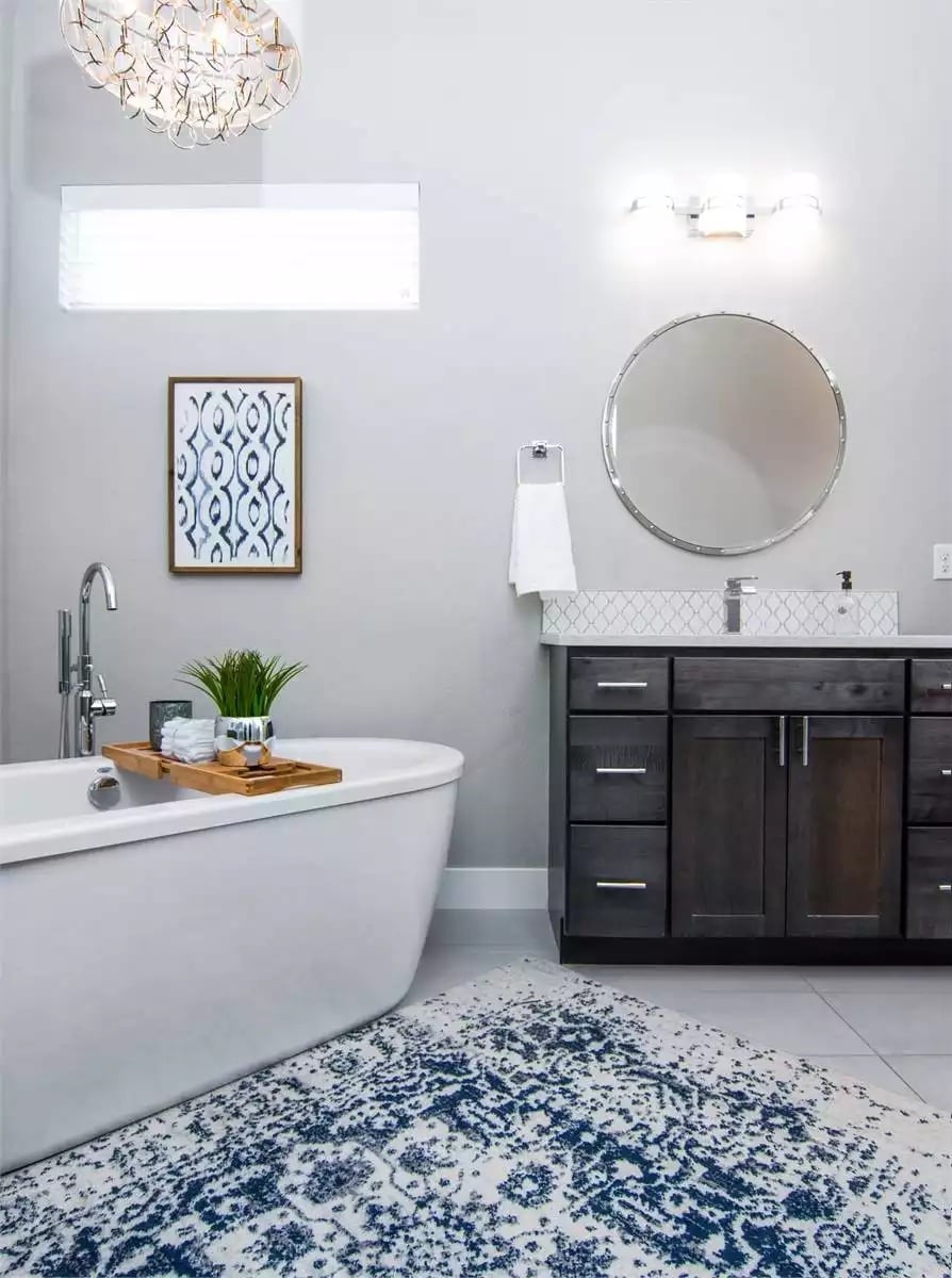 Freestanding Tub, Globe Chandelier, and a Bath Caddy That Actually Gets Used