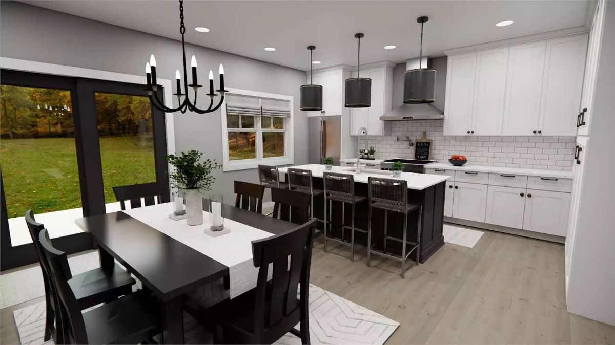 Dark Island, White Cabinets, and a Dining Area That Earns Its Square Footage