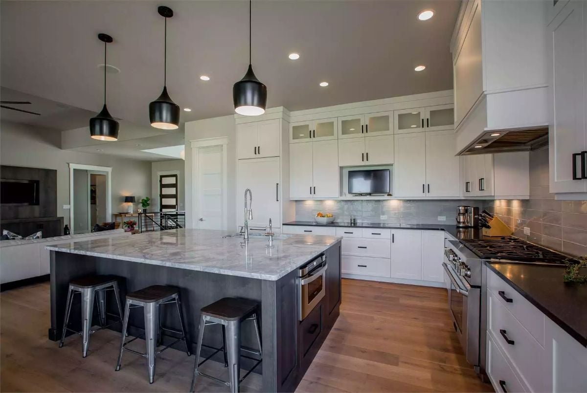 Dark Island Base Against White Cabinets Is Doing a Lot of Work