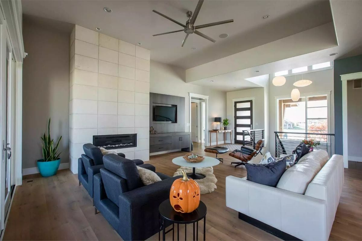 Tall Tile Fireplace Wall Does All the Heavy Lifting Here