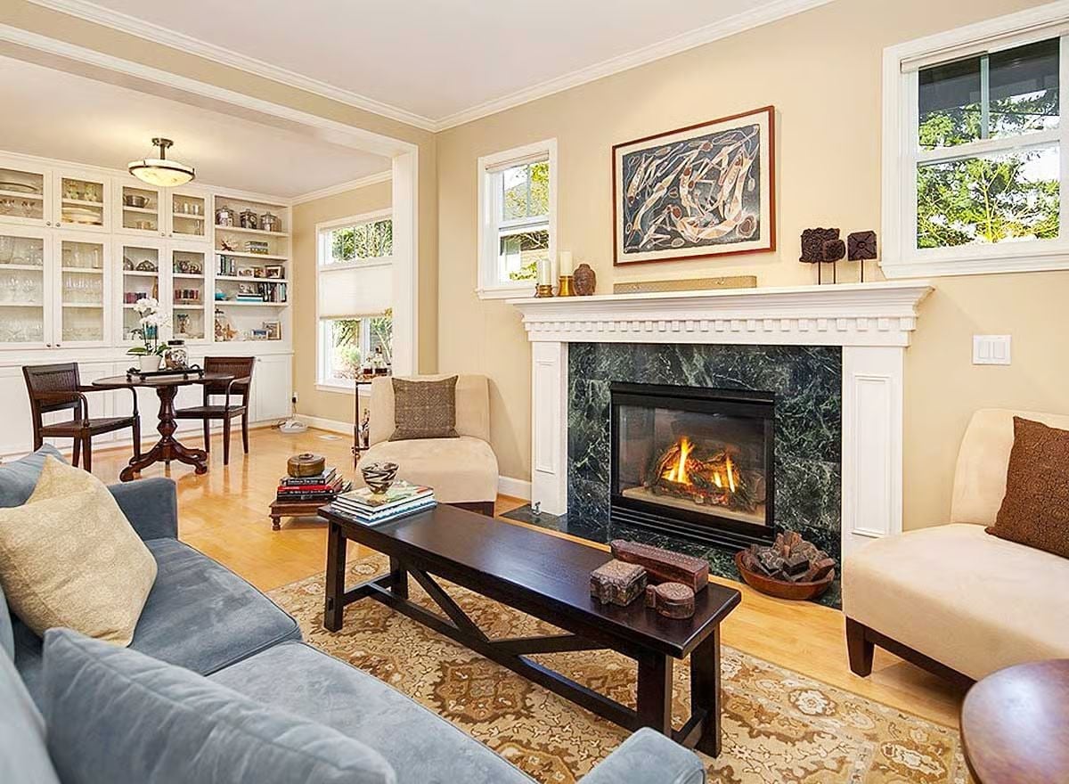 Green Marble Fireplace Surround Anchors a Living Room Built for Actual Living