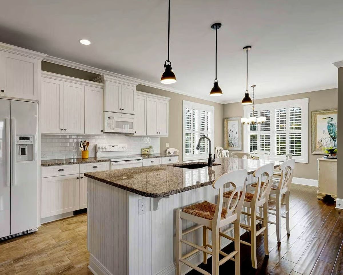 Beadboard Island and Dark Granite Make a Quiet Case for Cottage Kitchens