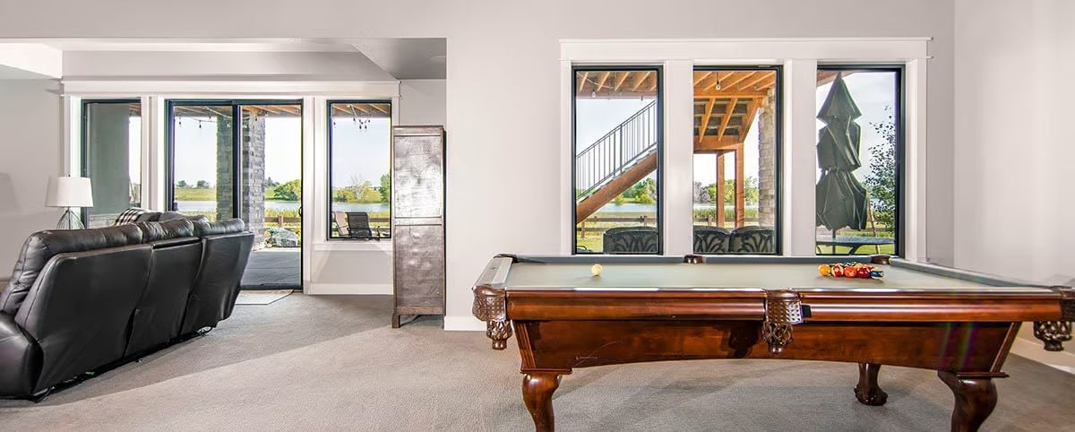 Billiards, Black Frames, and a Walkout That Opens to the Water