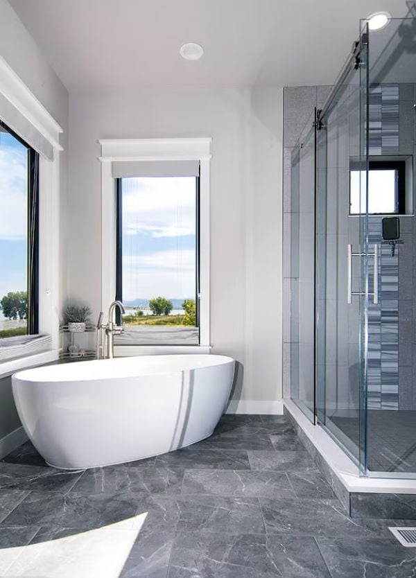 Freestanding Tub Positioned for a View No Art Could Replace