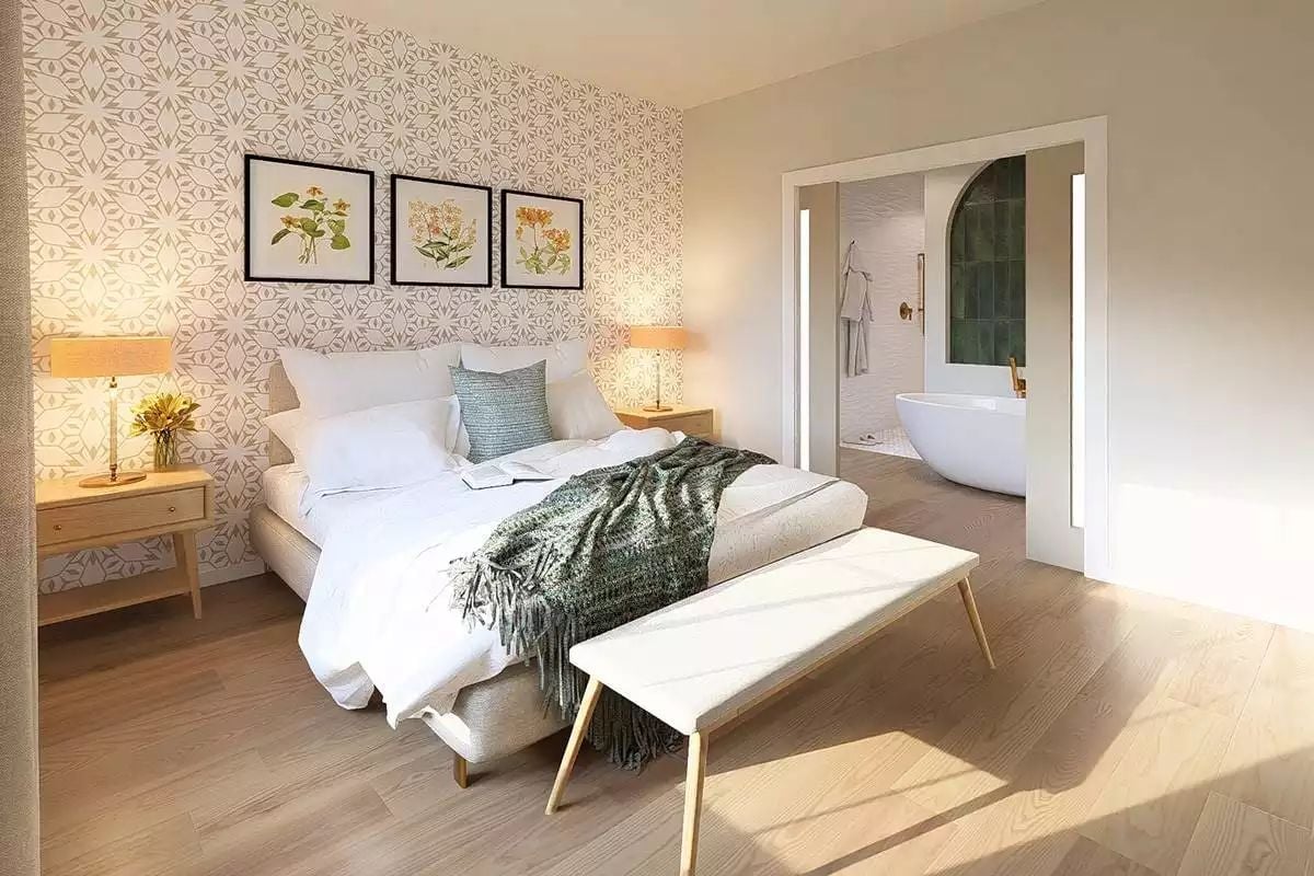 Botanical Prints, Patterned Wallpaper, and a Freestanding Tub Visible From Bed