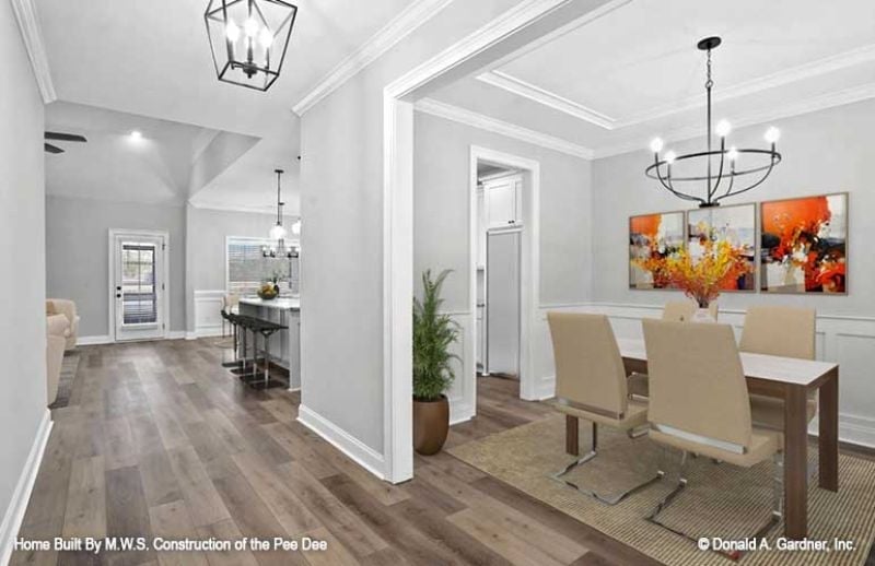 Warm Neutrals and Open Sightlines Pull Three Rooms Into One