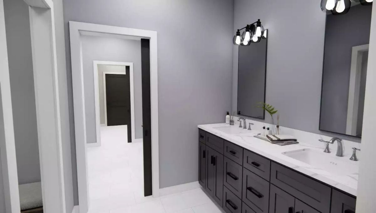 Double Vanity With Dark Cabinets That Pull More Weight Than They Let On