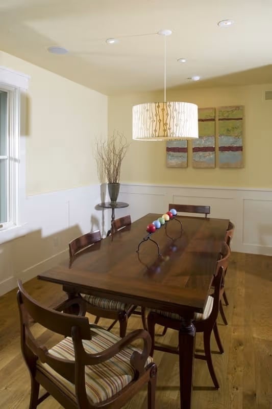 Drum Pendant and Wainscoting Give This Dining Room Quiet Confidence