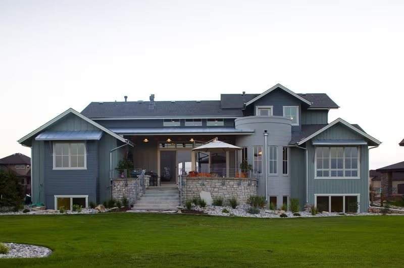 Stone-Base Deck and Covered Porch Built for Year-Round Outdoor Living