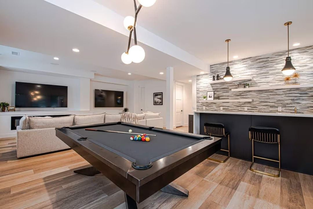 Dark Felt, Globe Pendants, and a Bar That Earns Its Own ZIP Code