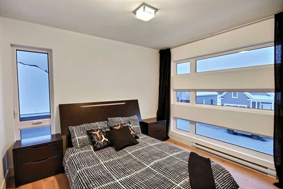 Zebra Blinds and Dark Wood Furniture That Skip the Apology