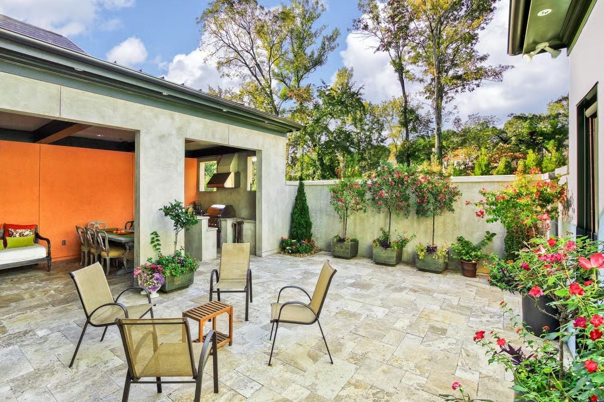 Courtyard Outdoor Kitchen and Rose Beds Built Around Actual Outdoor Living