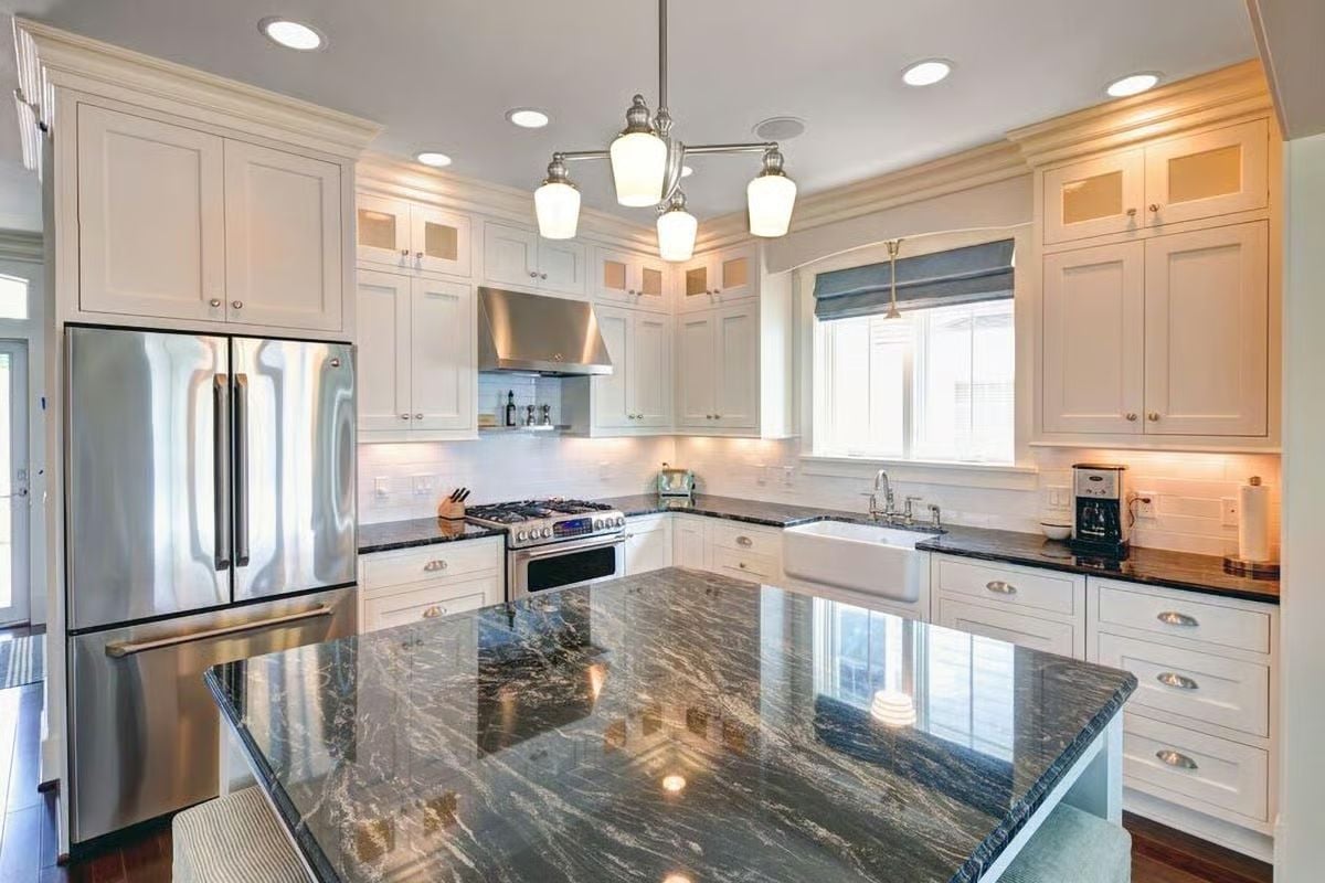 Polished Granite Island in a Kitchen That Actually Has Room to Work