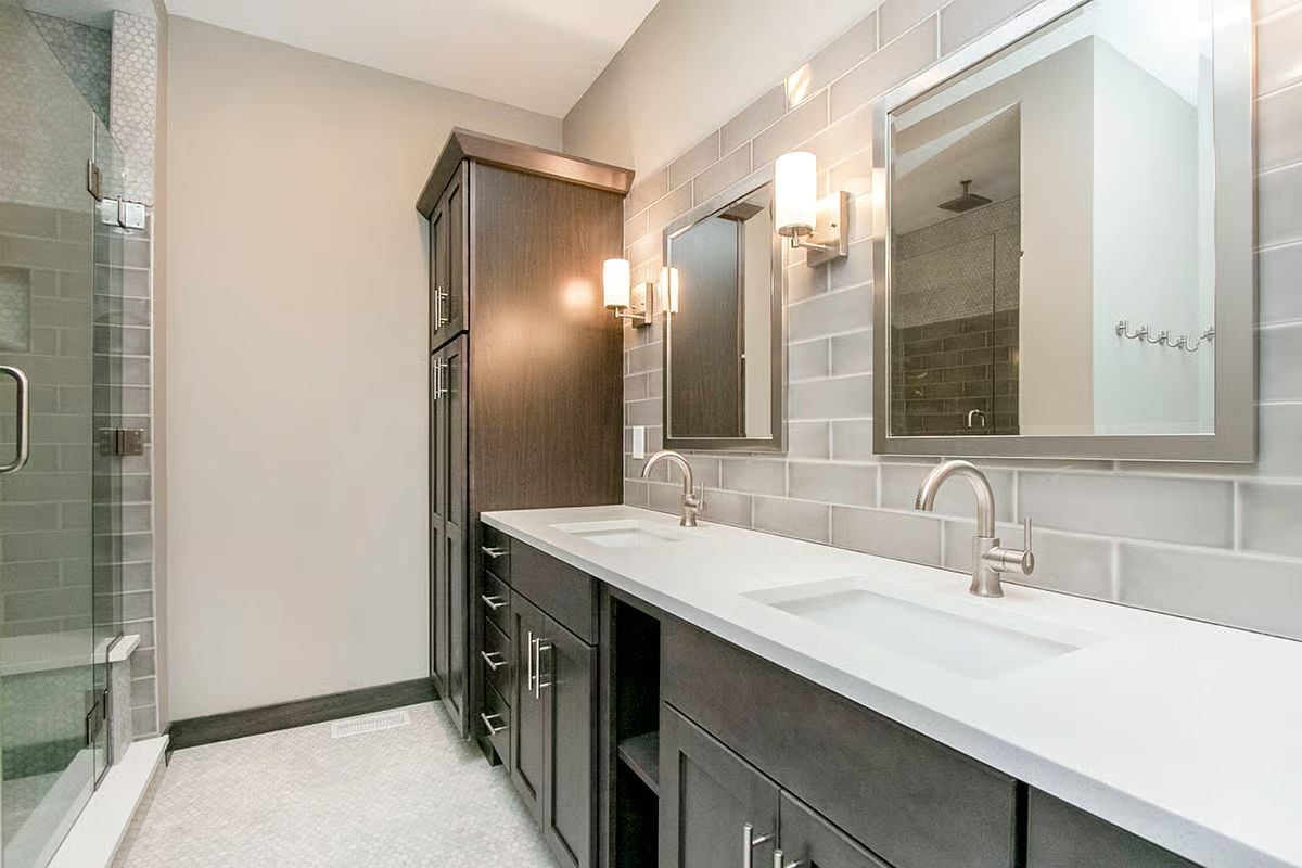 Dark Vanity Cabinets and Gray Subway Tile Doing Exactly Enough