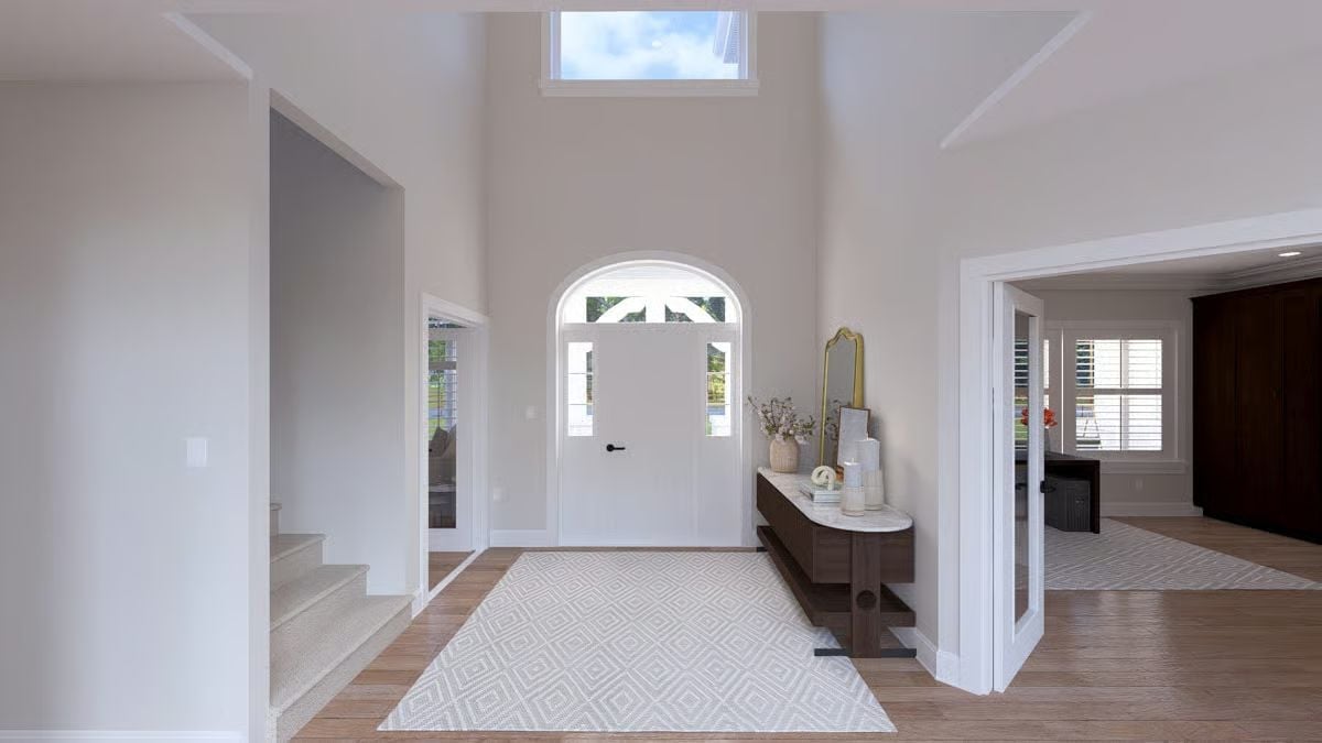 Soaring Foyer Entry Sets the Tone Before You See Another Room