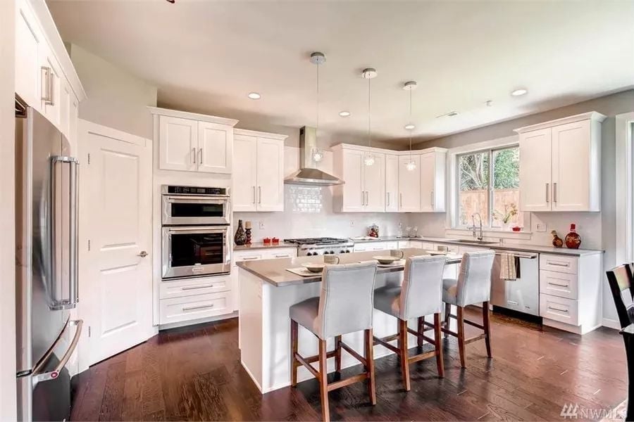 Double Wall Ovens and a Kitchen Island That Actually Has Enough Seating