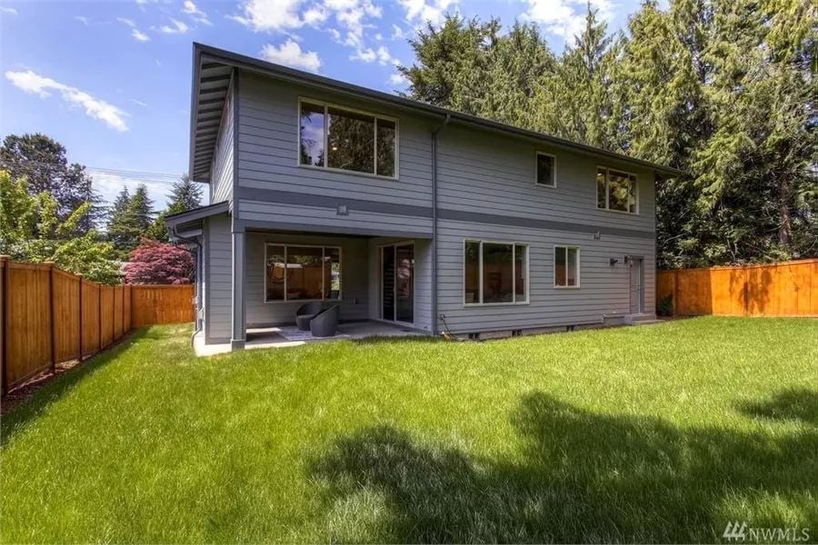 Gray Lap Siding and a Fully Fenced Backyard Built for Real Family Life