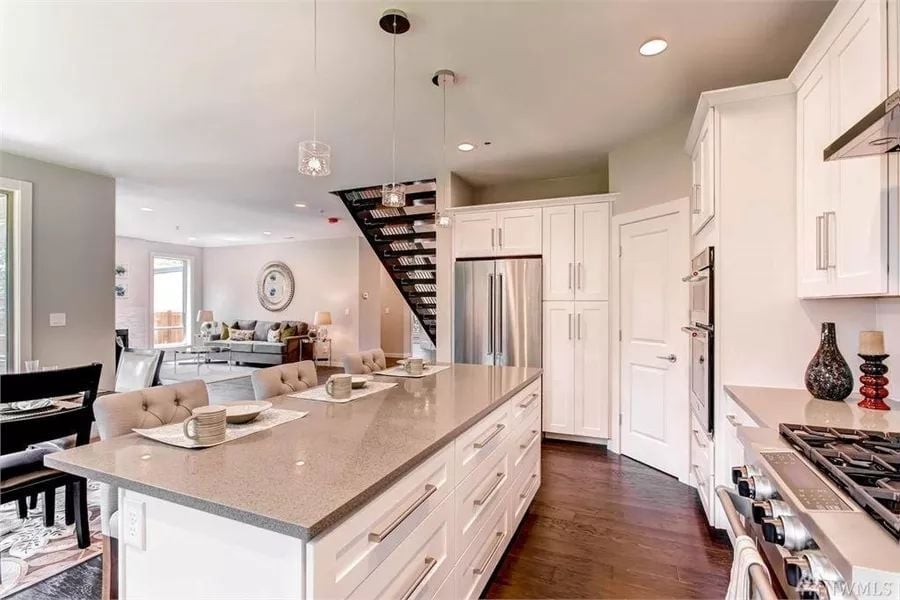 Quartz Island with Seating for Four and an Open View Straight to the Living Room