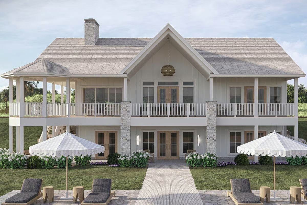 Scalloped Umbrellas and Stone Columns Make the Backyard Work as Hard as the House