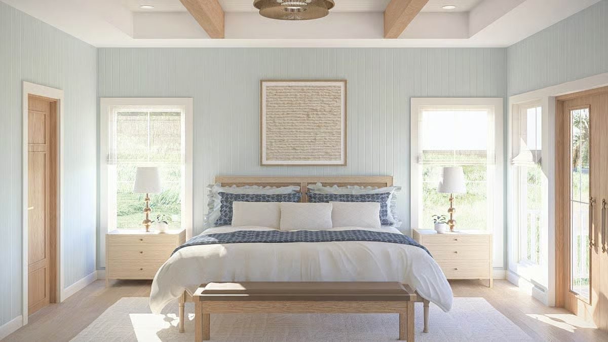 Soft Blue Bead Board and Natural Oak Keep This Primary Bedroom Grounded