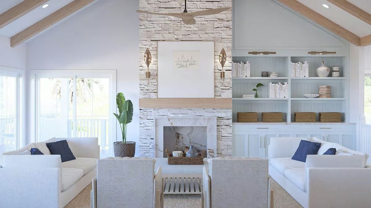 Stone Chimney Wall and Built-In Shelving Give This Great Room Its Backbone