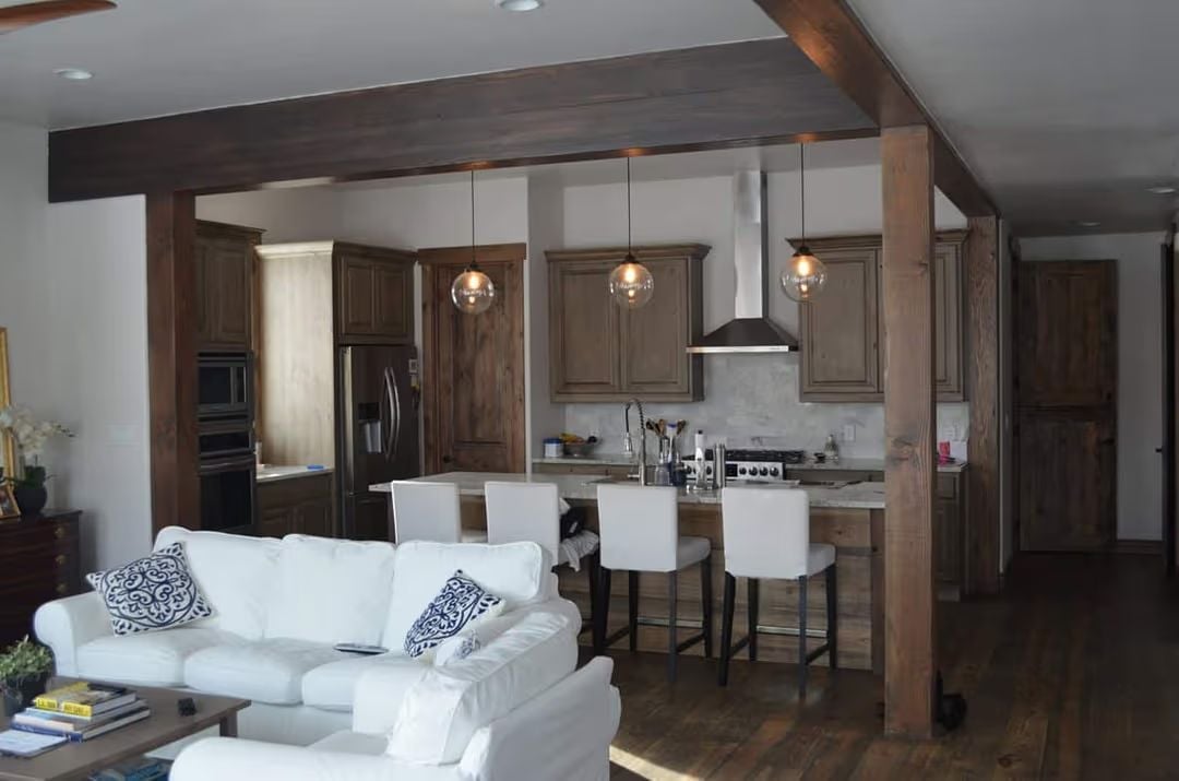 Open-Plan Kitchen Where Dark Wood Beams Do the Heavy Lifting