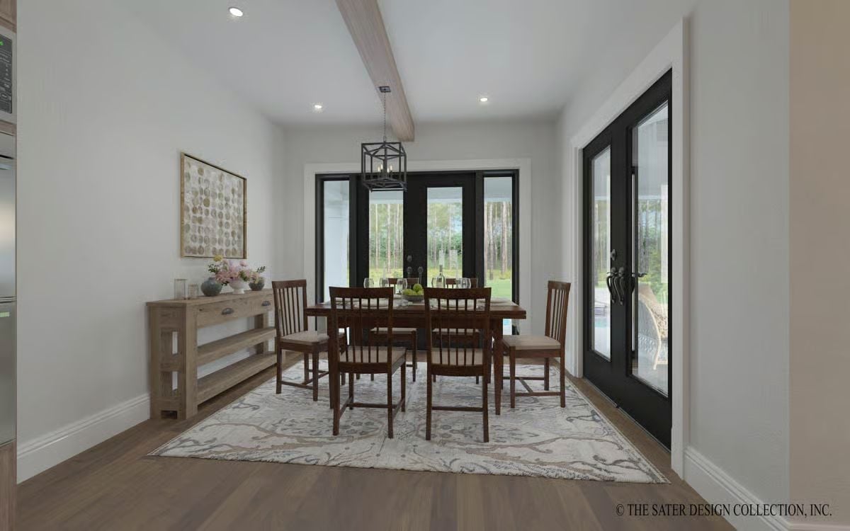 French Doors and an Exposed Beam Keep This Dining Room From Taking Itself Too Seriously