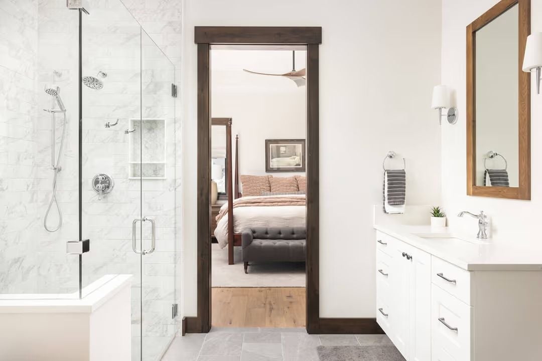 Marble Shower, Pocket Door, and a Vanity That Keeps Things Honest