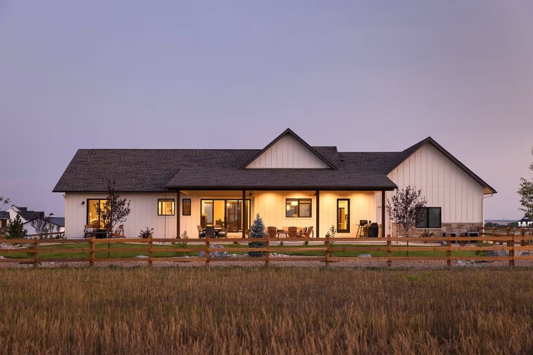 Warm Light Spills Across a Modern Farmhouse Patio at Dusk