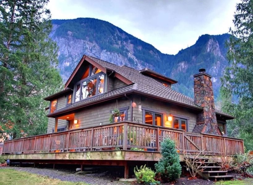 Stone Chimney and Wraparound Deck Built for Mountain Air and Nowhere to Be