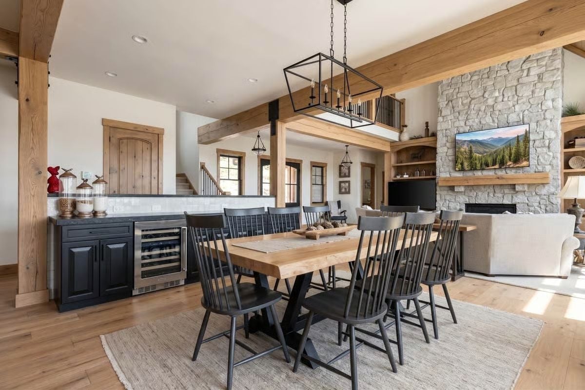 Black Windsor Chairs and a Wine Fridge Carry the Weight of Daily Living Here