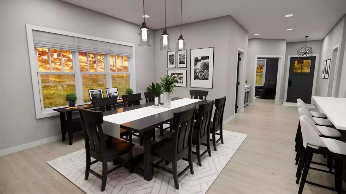 Dark Wood and Pendant Glass Make This Dining Room Worth Lingering In