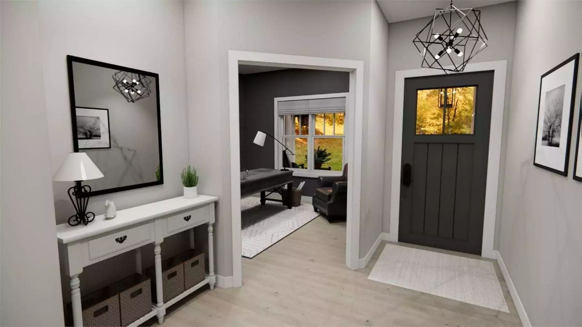 Geometric Chandelier and Dark Front Door Set the Tone Before You Step Inside
