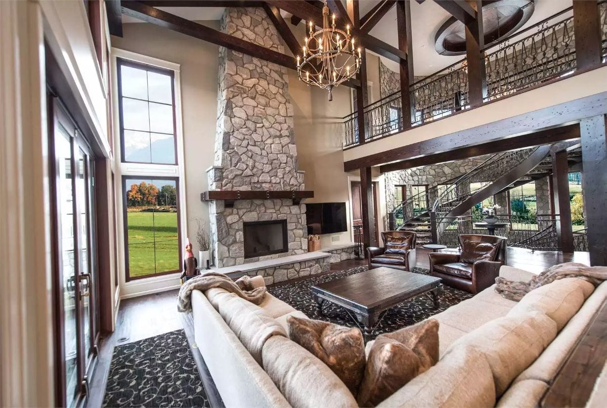 Soaring Stone Fireplace Anchors a Great Room Built Around Real Life