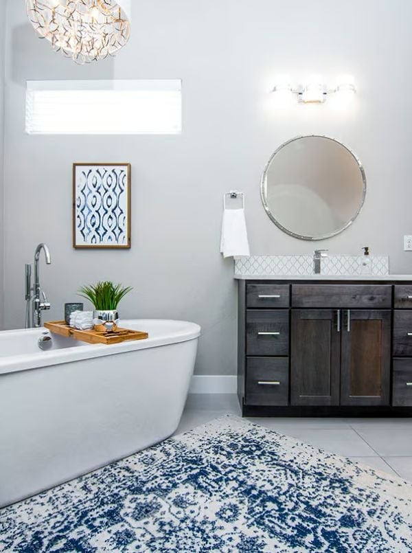 Freestanding Tub and Dark Vanity Cabinetry Pull in Opposite Directions (and It Works)