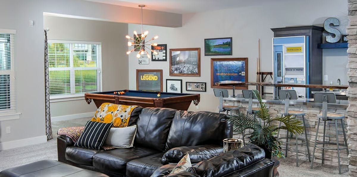 Leather, Pool Table, and a Bar Counter Built for People Who Actually Use Their Basement