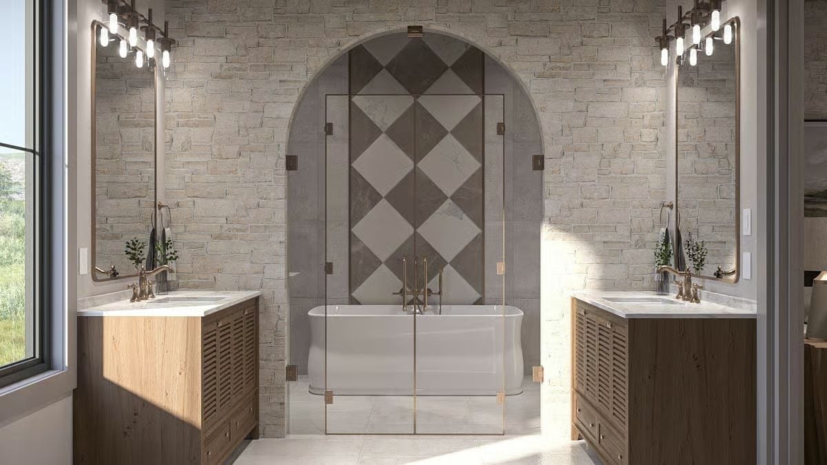 Arched Stone Alcove and Freestanding Tub Centered Like They Mean It