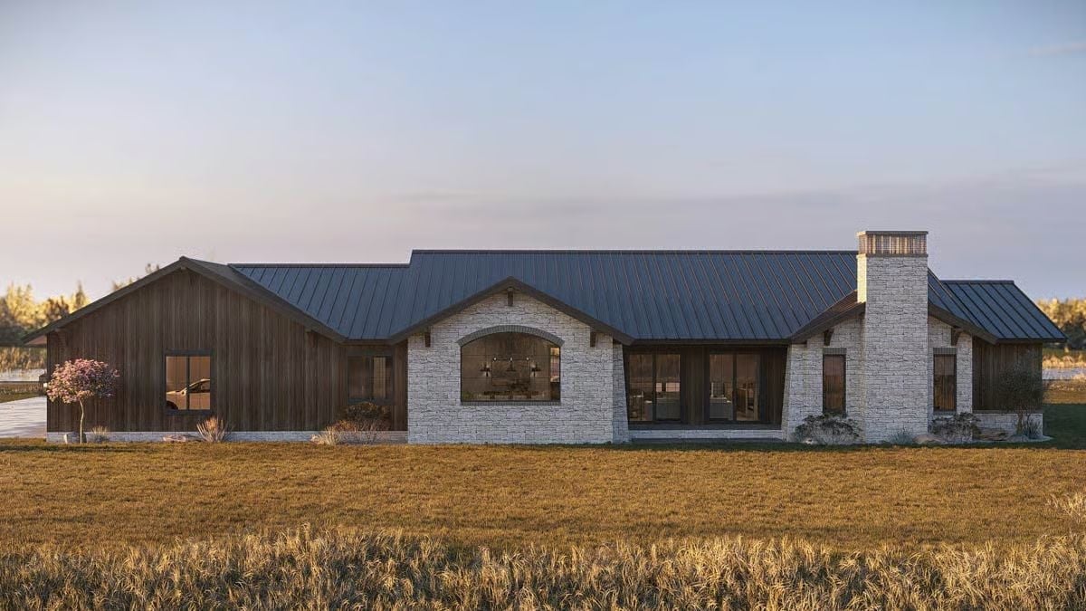 Dark Metal Roofing and Limestone Walls Built for Wide-Open Texas Sky