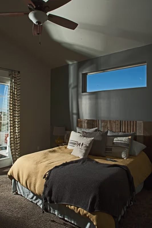 Reclaimed Wood Headboard and Gold Bedding That Don't Need to Try Hard
