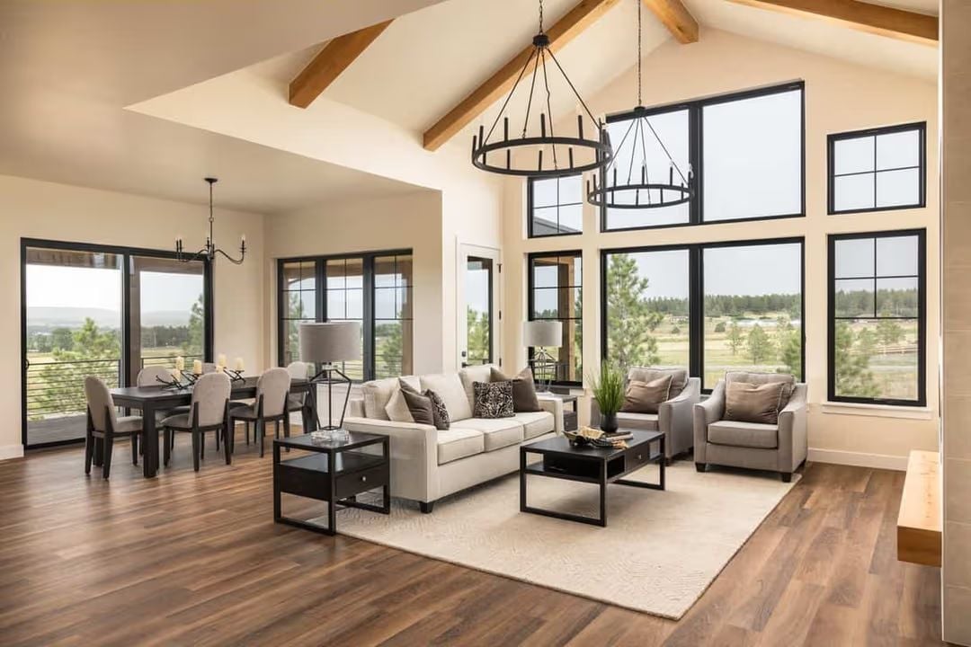 Vaulted Beams and Black-Frame Glass Turn Panoramic Views Into the Main Event