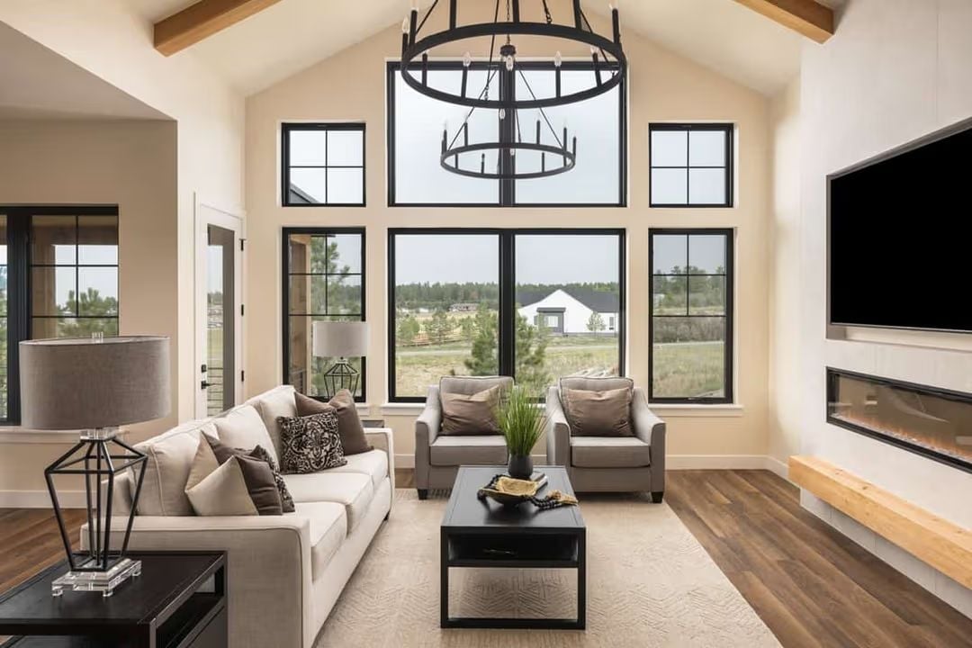 Vaulted Ceilings and Black-Frame Windows Pull the Outside In