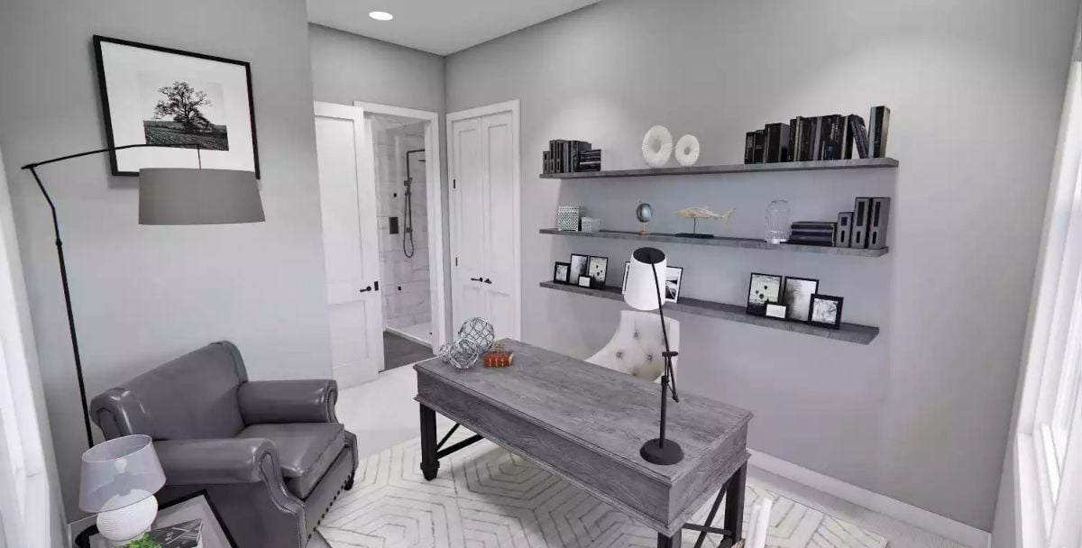 Floating Shelves, a Weathered Desk, and Proof That Gray Rooms Don't Have to Be Cold