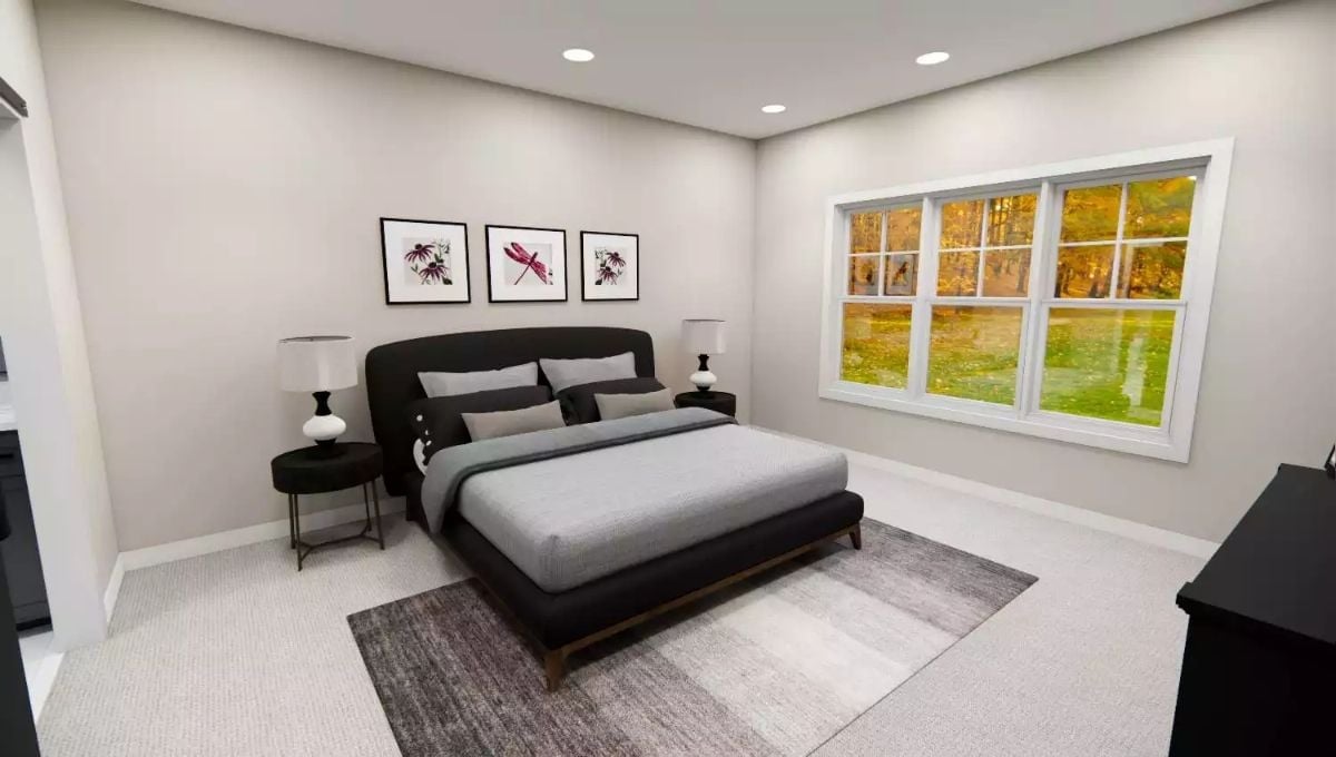 Dark Headboard, Gray Bedding, and Three Framed Prints That Hold the Wall Together