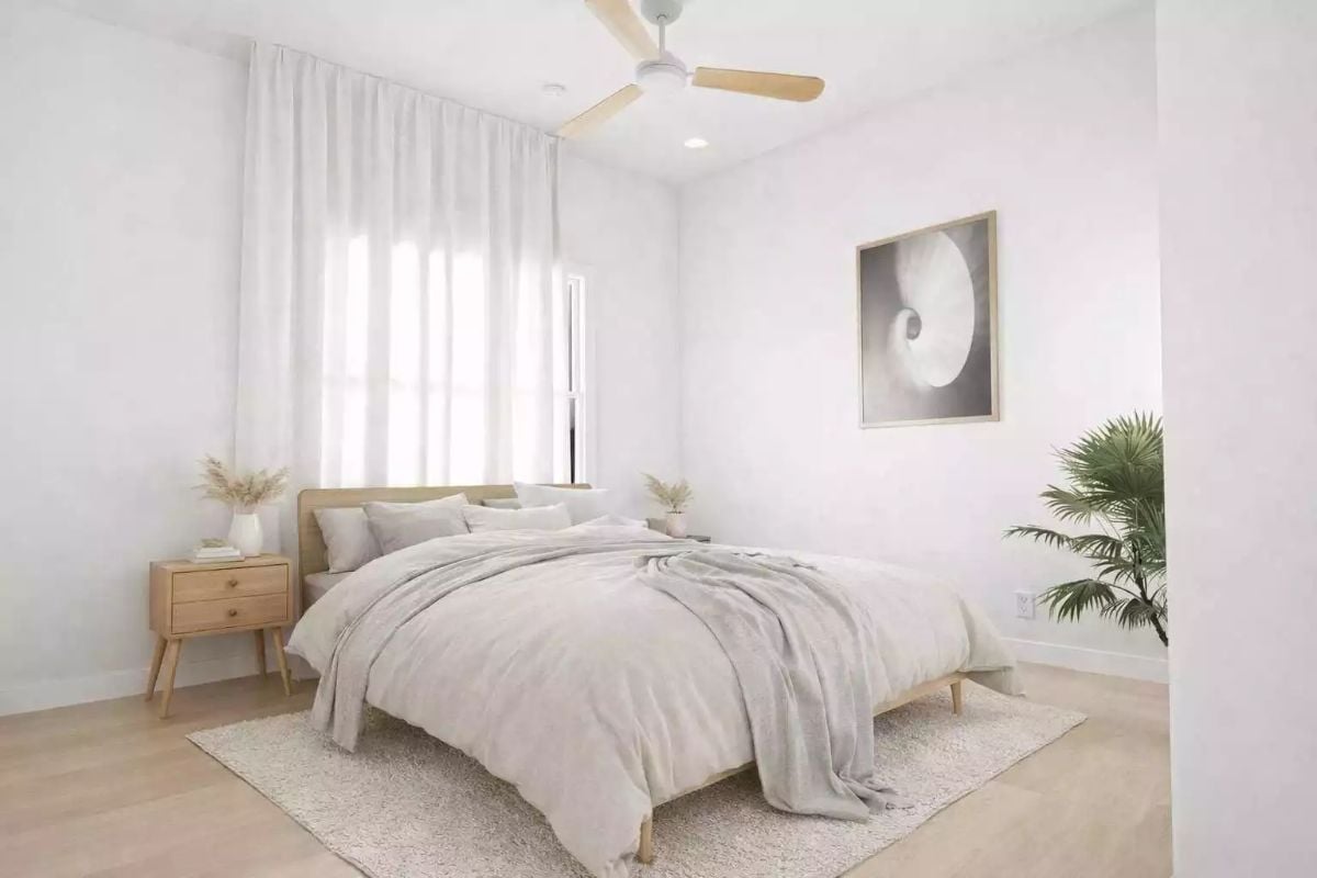Pale Linen and a Rattan Headboard Built to Make 6 A.M. Feel Earned
