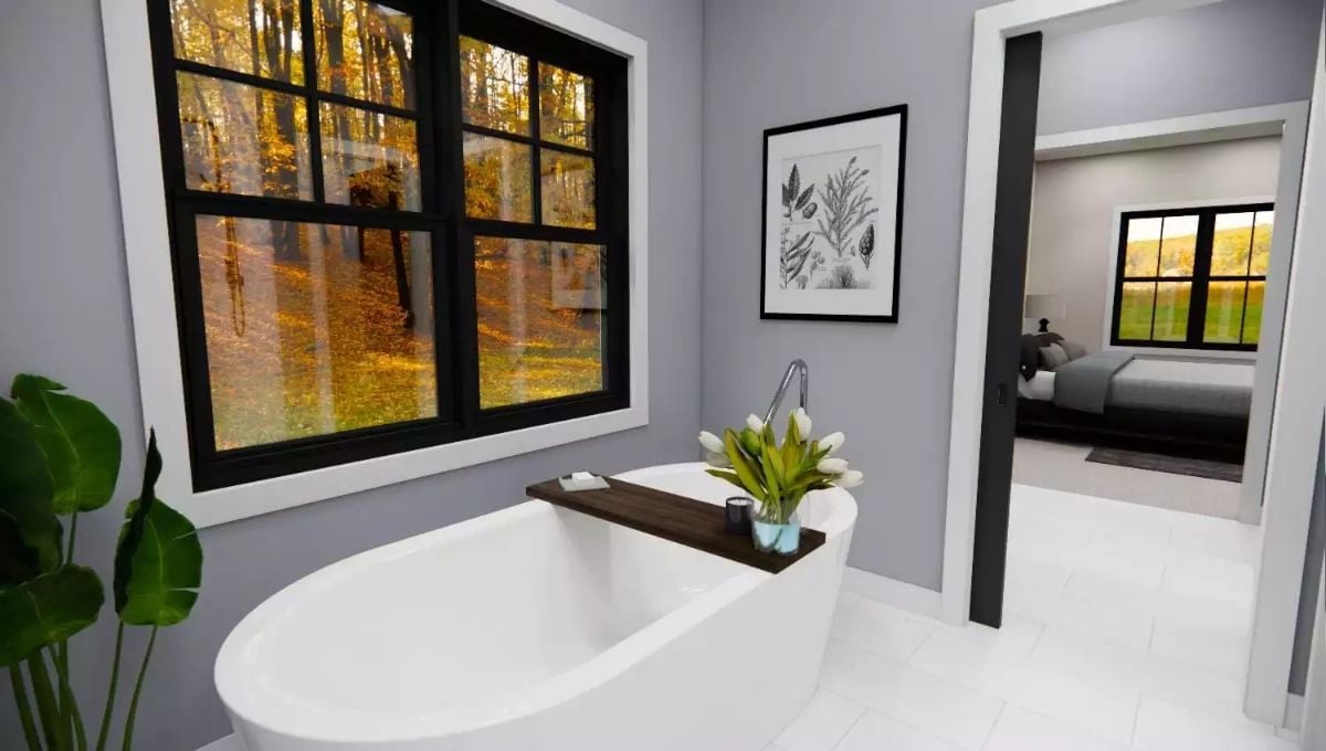 Freestanding Tub Positioned to Catch the Fall Forest at Its Peak